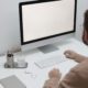 Free Crop man working on computer in workplace Stock Photo